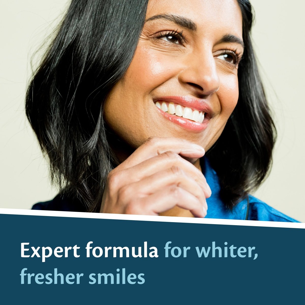 Woman with a bright smile and text about an expert formula for whiter, fresher smiles.