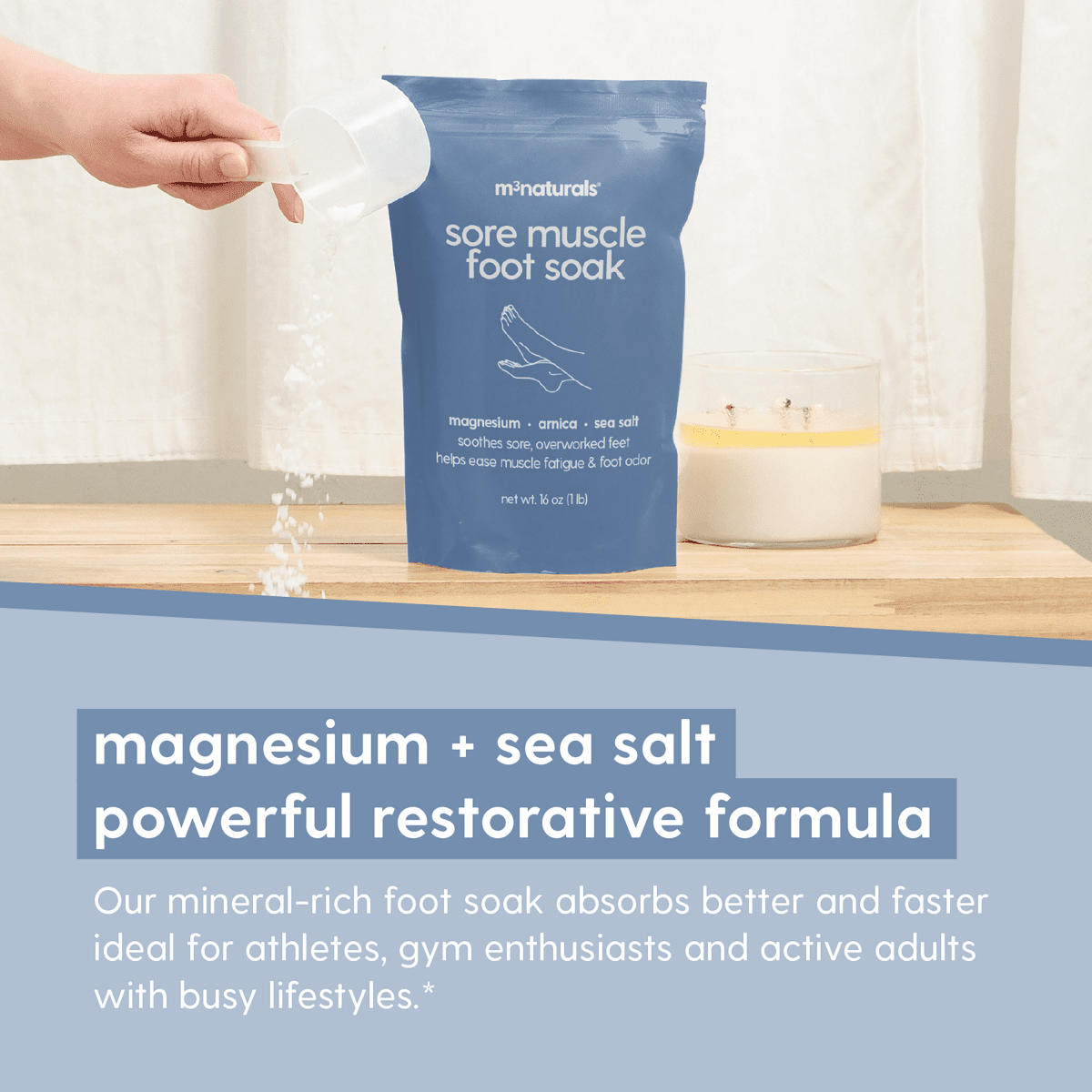 M3 sore muscle foot soak packaging with a hand pouring the foot soak out of a scoop, with text describing the restorative magnesium and sea salt formula.